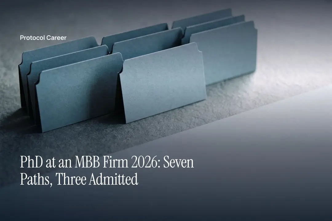Seven plain cardstock file dividers on a stone surface, with three separated from the rest. Title: “PhD at an MBB Firm 2026: Seven Paths, Three Admitted”, over the Protocol Career wordmark.