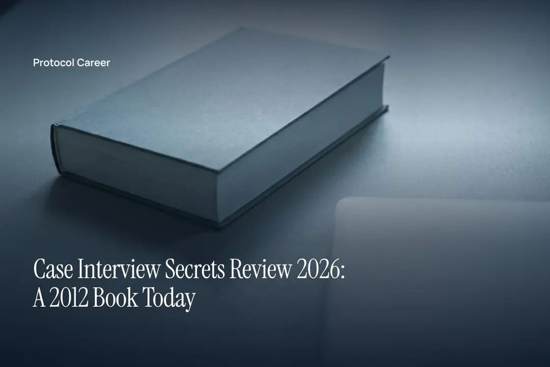 A blank paperback book resting on a neutral matte surface under soft studio lighting. Title: “Case Interview Secrets Review 2026: A 2012 Book Today”, over the Protocol Career wordmark.