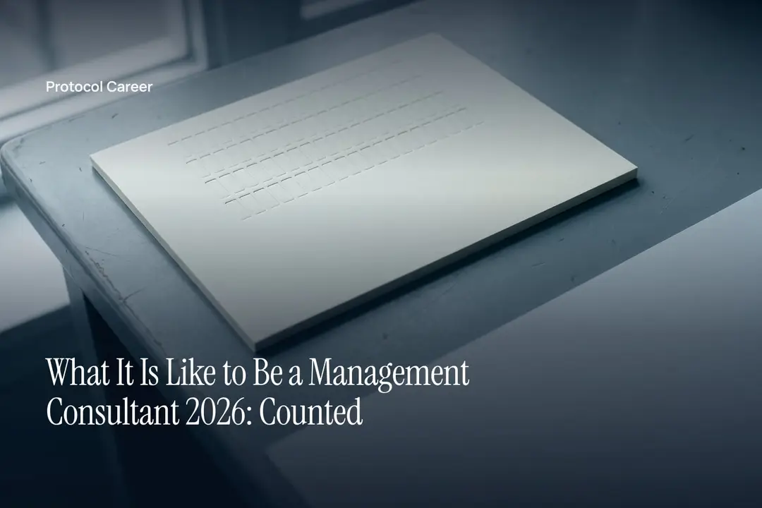 A textured cream sheet with an embossed blank schedule grid rests on a neutral surface under soft light. Title: “What It Is Like to Be a Management Consultant 2026: Counted”, over the Protocol Career wordmark.