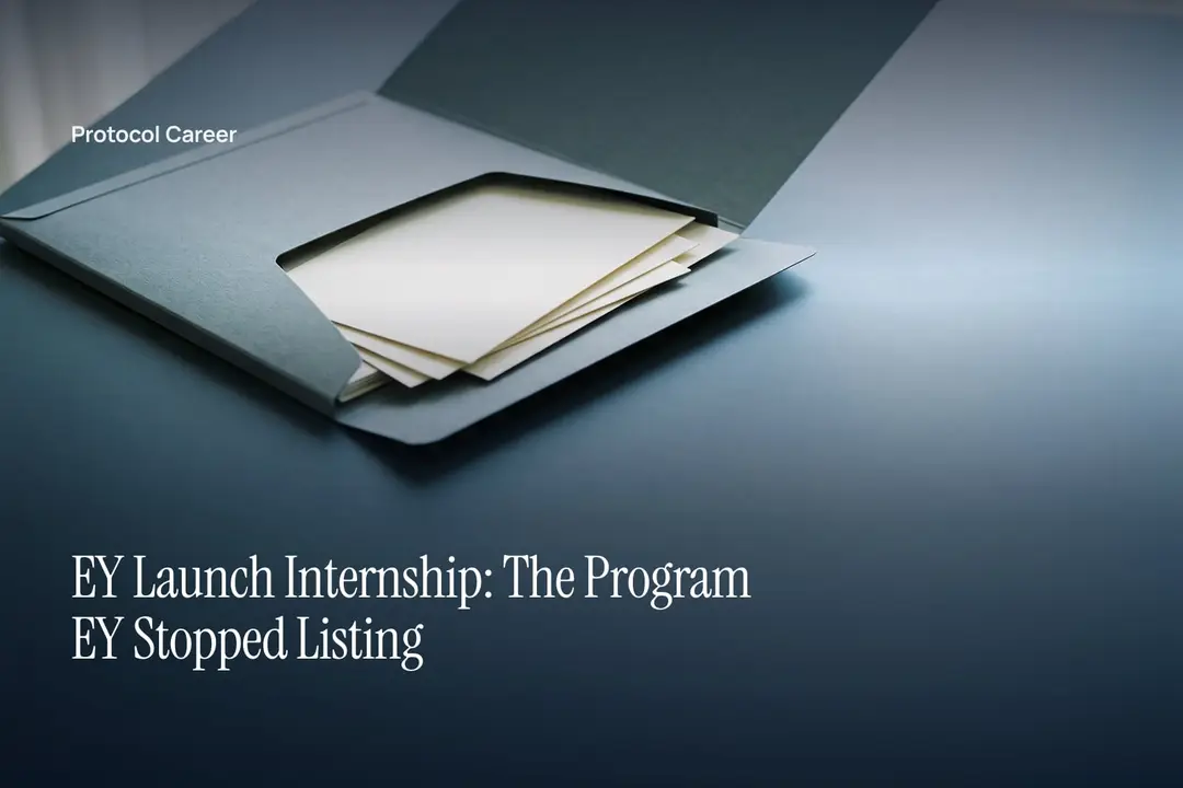 An open grey file folder containing blank cream-colored paper cards on a smooth slate surface. Title: “EY Launch Internship: The Program EY Stopped Listing”, over the Protocol Career wordmark.