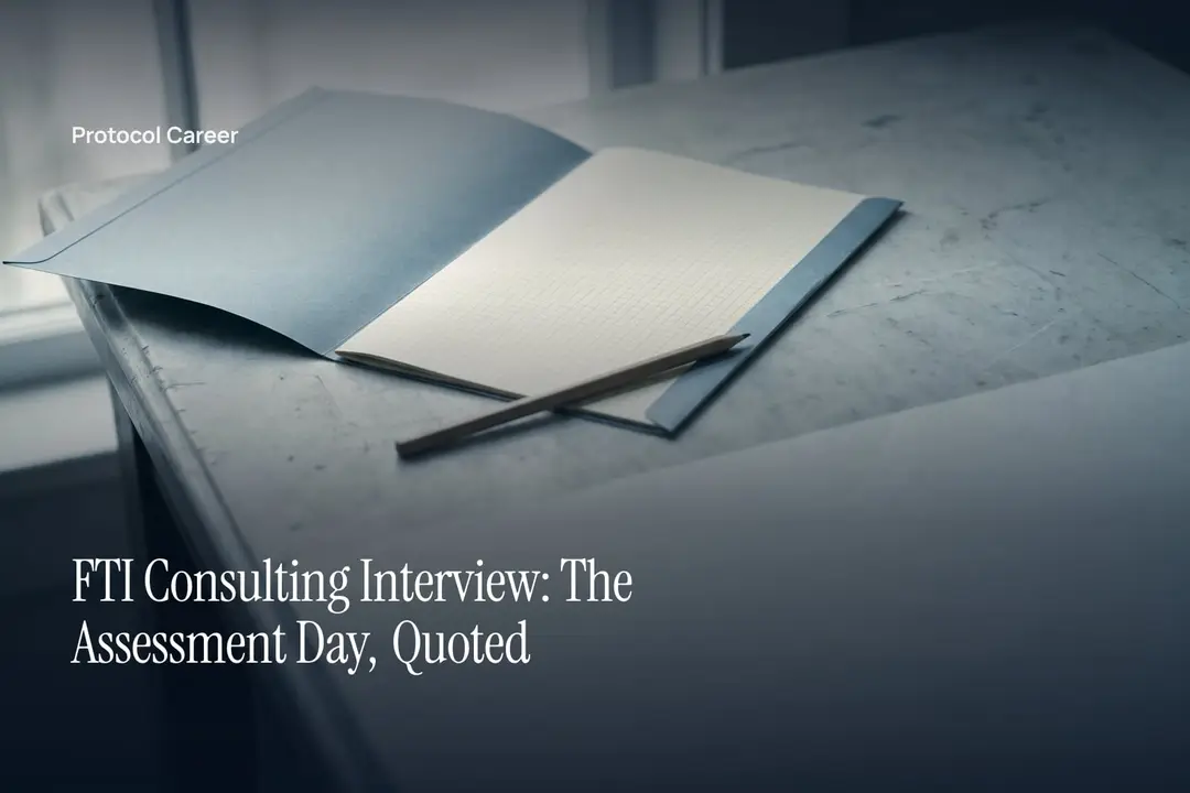 An open grey folder with blank grid sheets and a wooden pencil on a neutral stone surface. Title: “FTI Consulting Interview: The Assessment Day, Quoted”, over the Protocol Career wordmark.