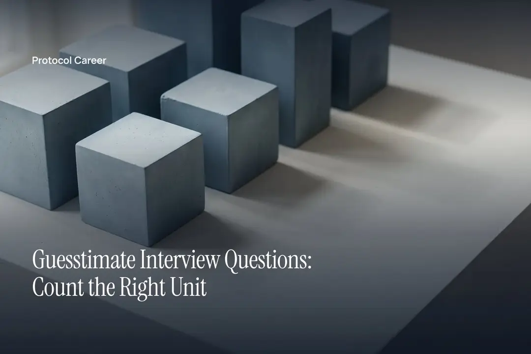 Neutral plaster geometric blocks and cubes clustered together on an empty pale surface under soft directional light. Title: “Guesstimate Interview Questions: Count the Right Unit”, over the Protocol Career wordmark.
