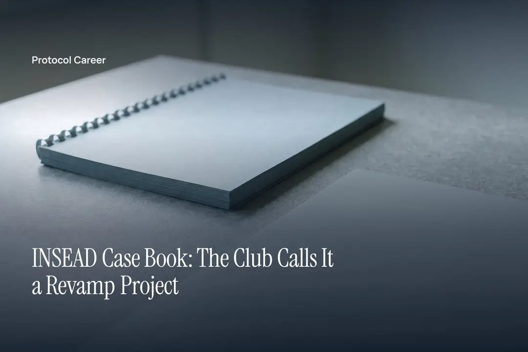 A thick blank comb-bound document lies on a neutral matte table in soft side lighting. Title: “INSEAD Case Book: The Club Calls It a Revamp Project”, over the Protocol Career wordmark.