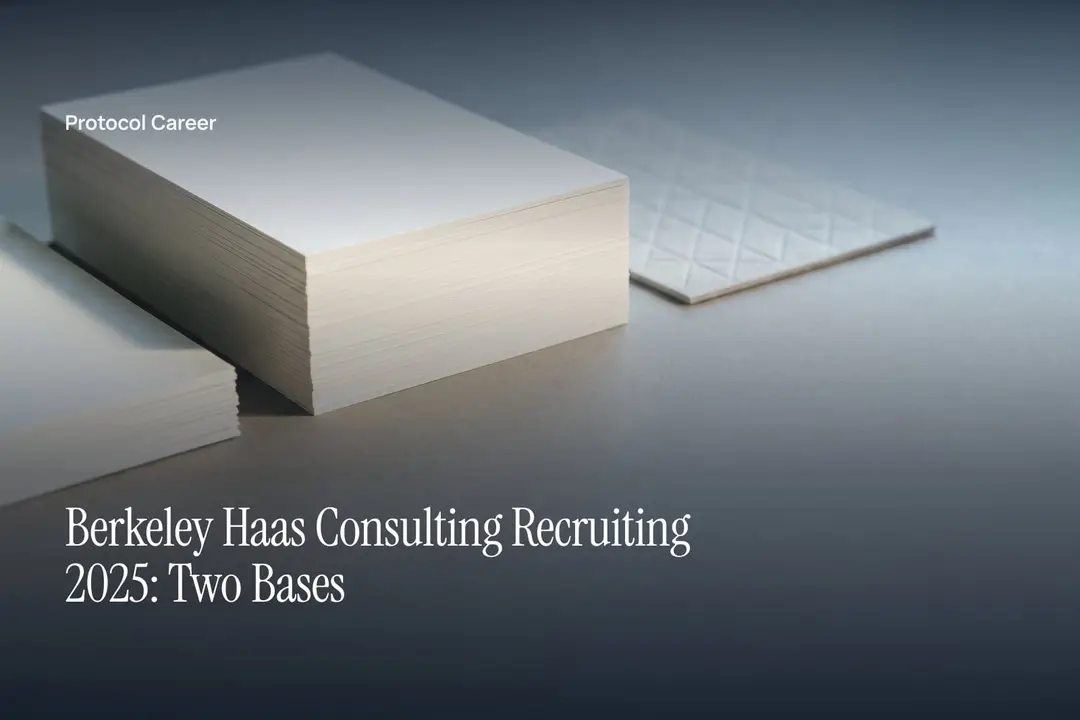 Two neat, blank paper stacks of differing heights cast soft shadows on a minimalist grey surface. Title: “Berkeley Haas Consulting Recruiting 2025: Two Bases”, over the Protocol Career wordmark.
