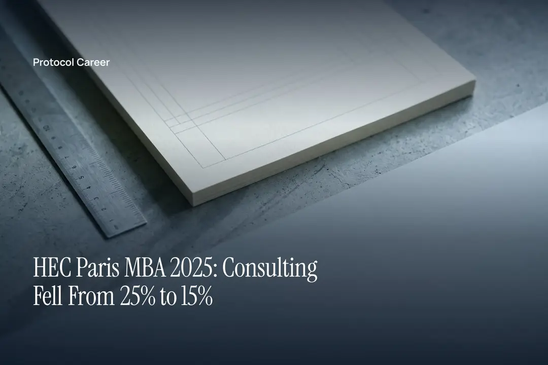 A blank printed grid document and metal drafting ruler lie on a smooth, softly lit grey surface. Title: “HEC Paris MBA 2025: Consulting Fell From 25% to 15%”, over the Protocol Career wordmark.