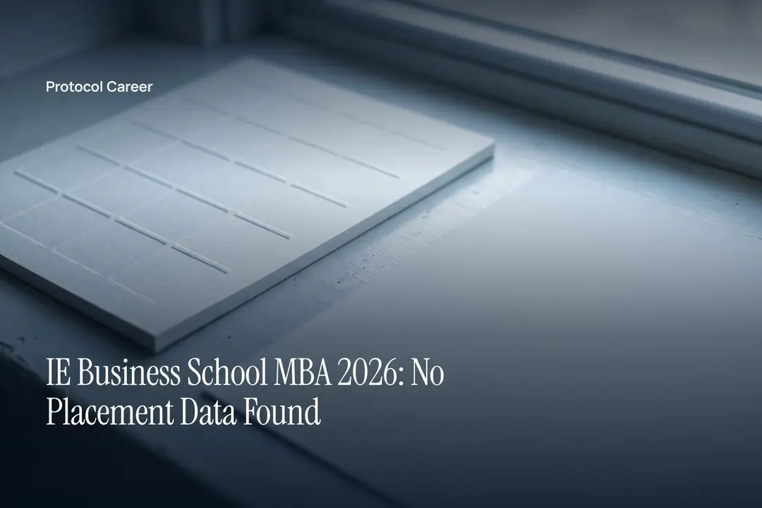 A single sheet of paper with an empty debossed grid resting on a smooth grey surface. Title: “IE Business School MBA 2026: No Placement Data Found”, over the Protocol Career wordmark.
