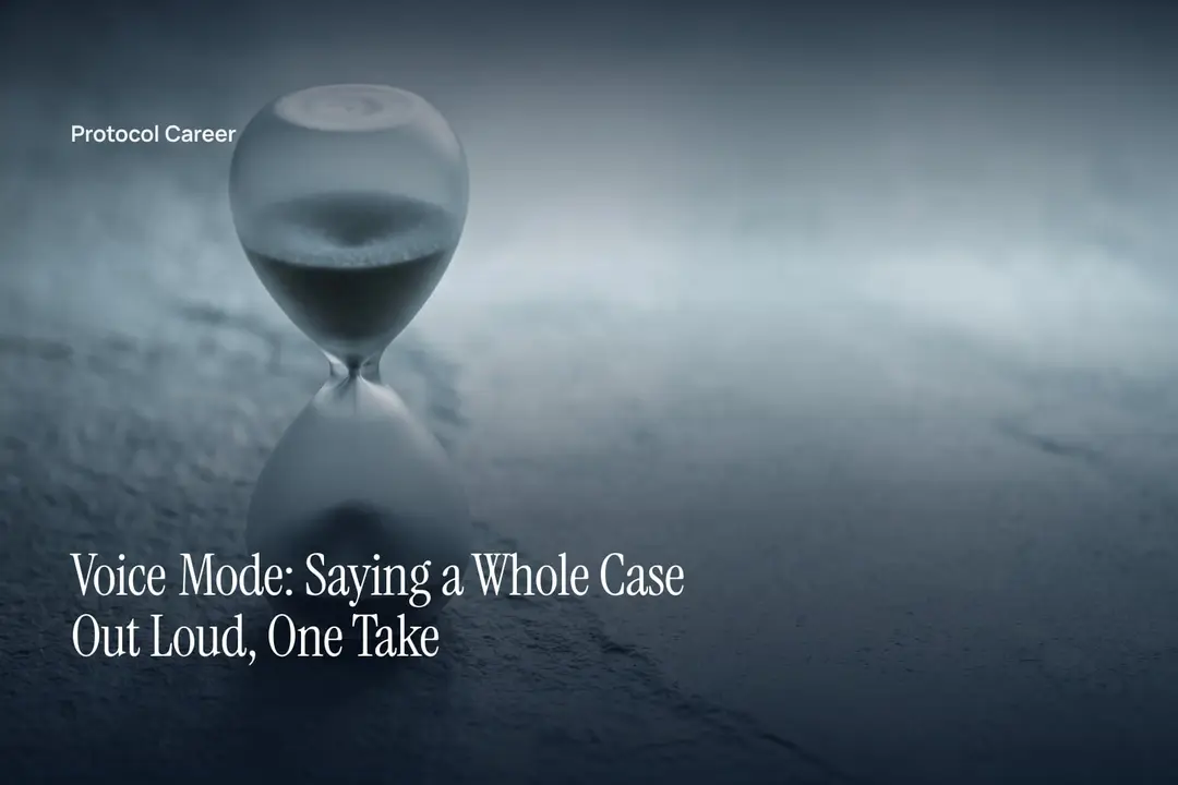 A minimalist glass sand timer resting on a flat limestone surface under soft directional light. Title: “Voice Mode: Saying a Whole Case Out Loud, One Take”, over the Protocol Career wordmark.